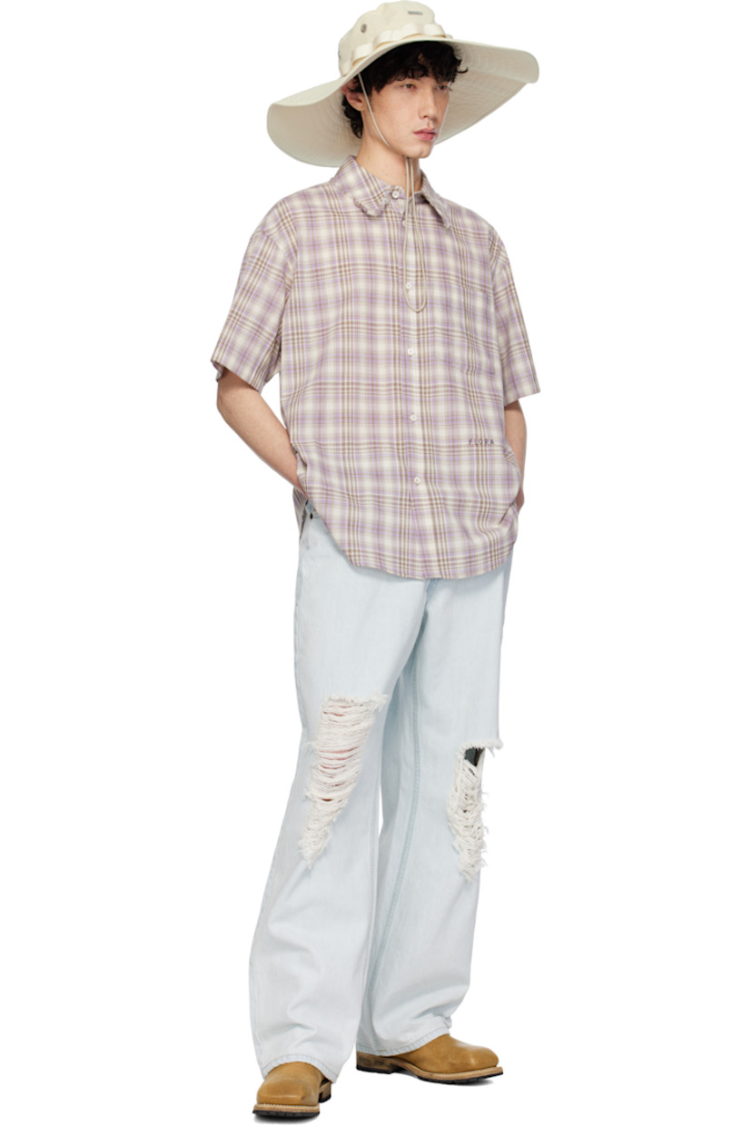 Non-stretch denim jeans. Fading and distressing throughout.

· Belt loops
· Five-pocket styling
· Zip-fly
· Logo patch at back waistband
· Contrast stitching in yellow

Supplier color: Light indigo