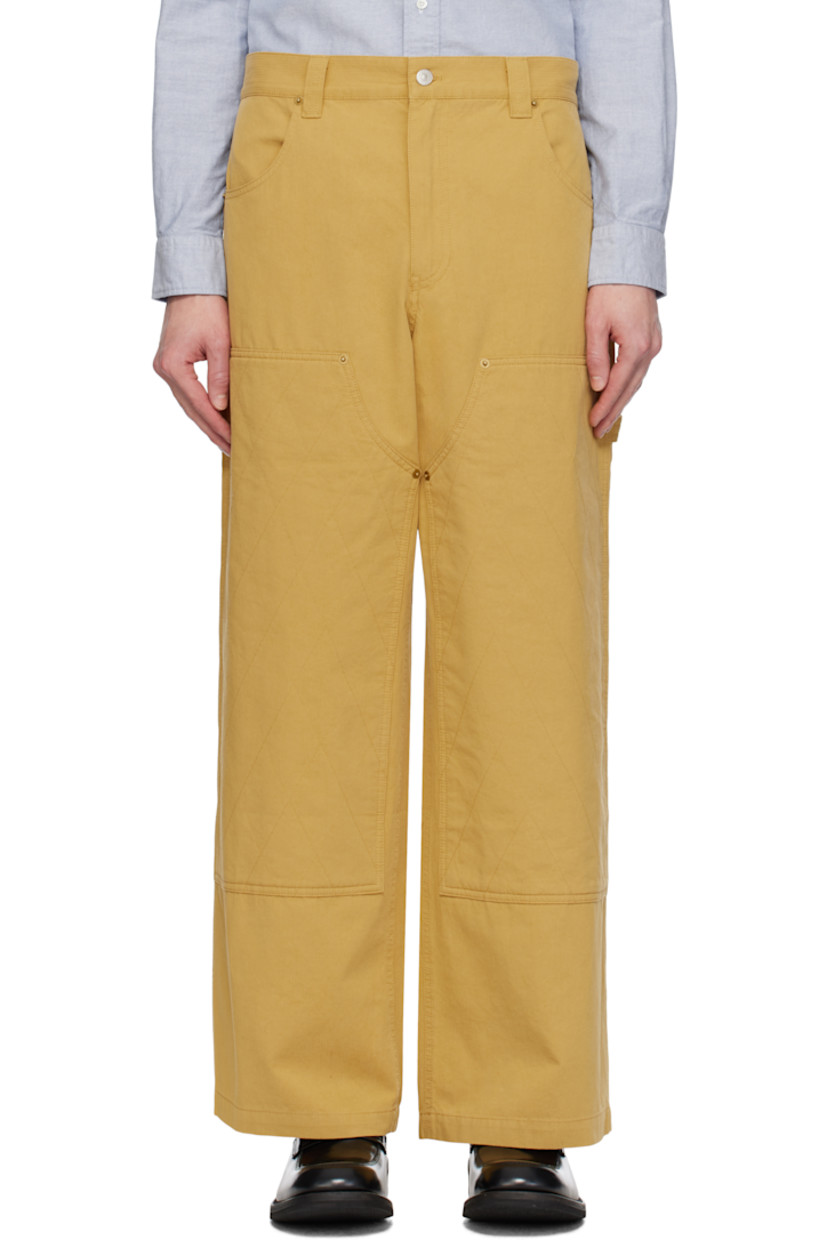 Cotton twill trousers.

· Belt loops
· Four-pocket styling
· Zip-fly
· Quilted panel at front legs
· Hammer loop at outseam

Supplier color: Yellow