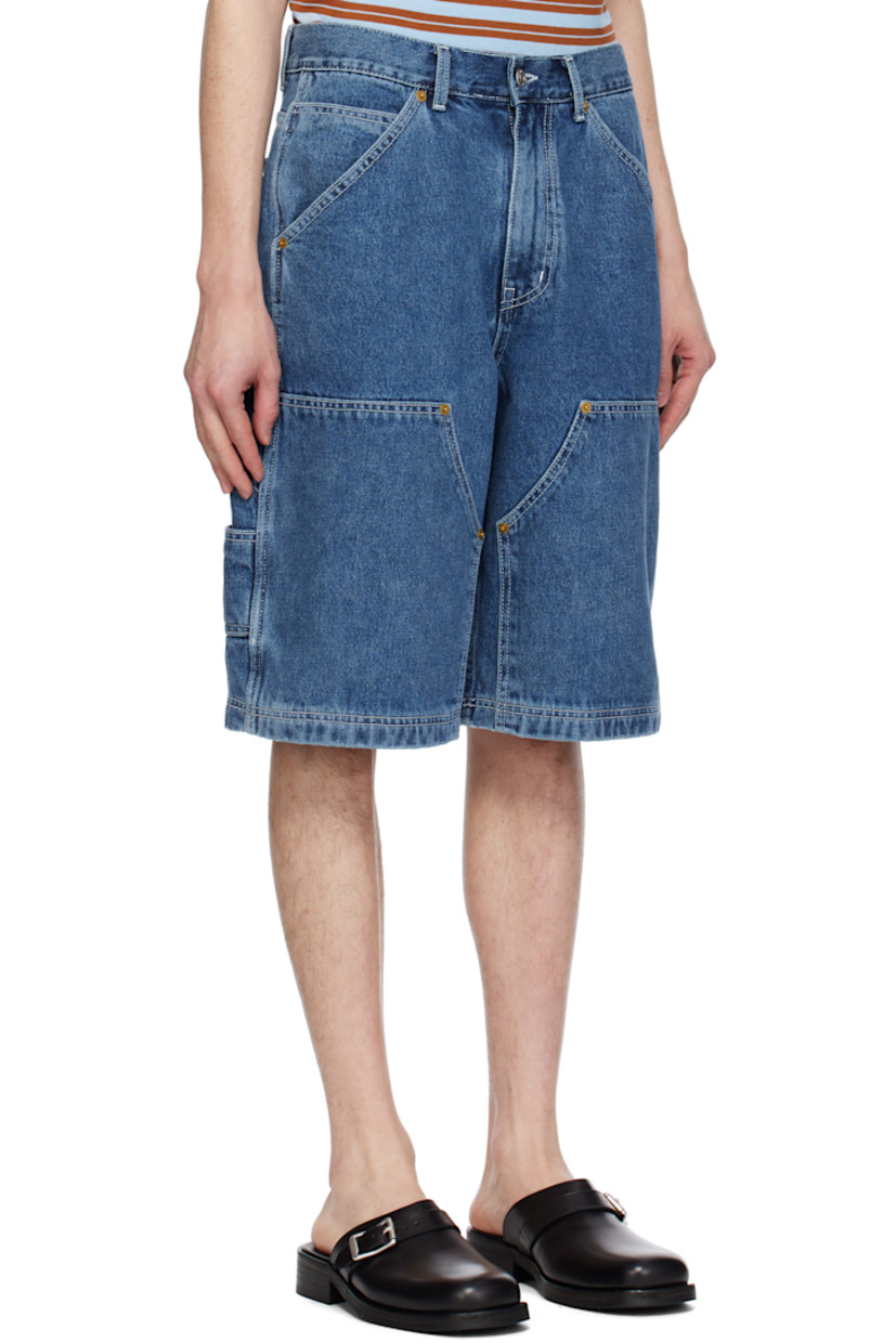 Non-stretch denim shorts. Fading throughout.

· Belt loops
· Five-pocket styling
· Zip-fly
· Patch pockets at outseam
· Logo patch at back waistband

Supplier color: Indigo