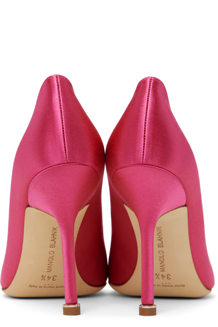 Handcrafted satin heels in pink.

· Pointed toe
· Crystal-cut buckle accent at vamp
· Logo patch at padded leather footbed
· Buffed kidskin and suede lining
· Covered stiletto heel with rubber injection
· Nubuck sole
· Heel: H3.75"

Supplier color: Pink
