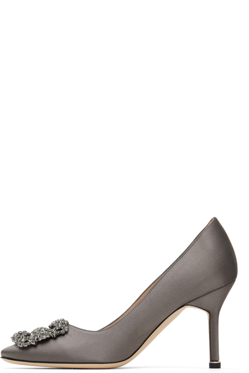 Satin heels in gray. 

· Pointed toe
· Buckle with prong-set crystals at vamp
· Inset logo patch at padded footbed
· Polished goatskin lining
· Covered stiletto heel with rubber injection
· Nubuck sole
· Heel: H3.5"

Supplier color: Dark grey