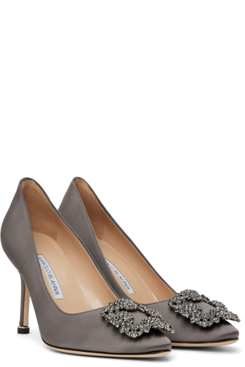 Satin heels in gray. 

· Pointed toe
· Buckle with prong-set crystals at vamp
· Inset logo patch at padded footbed
· Polished goatskin lining
· Covered stiletto heel with rubber injection
· Nubuck sole
· Heel: H3.5"

Supplier color: Dark grey