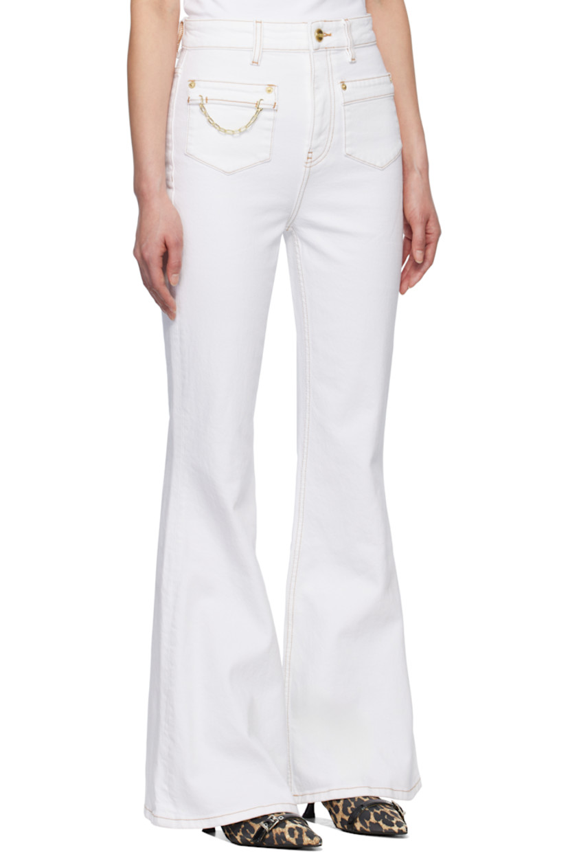 Stretch organic cotton denim jeans.

· Belt loops
· Four-pocket styling
· Zip-fly
· Cable chain at front pocket
· Logo patch at back pocket
· Contrast stitching in tan

Supplier color: Bright white
