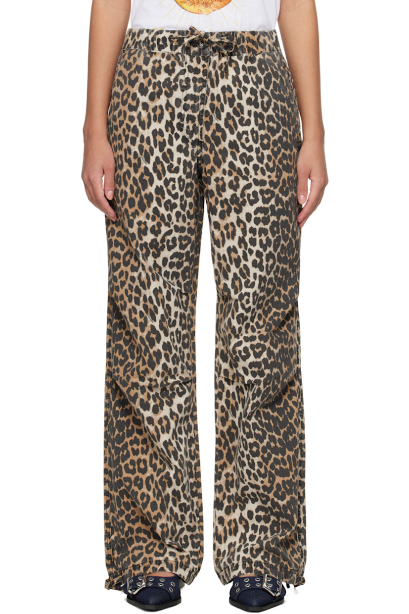 Stretch organic cotton canvas trousers. Logos and leopard pattern print throughout. 

· Drawstring at elasticized waistband and cuffs
· Three-pocket styling
· Zip-fly
· Tucks at knees
· Logo-engraved hardware

Supplier color: Almond milk