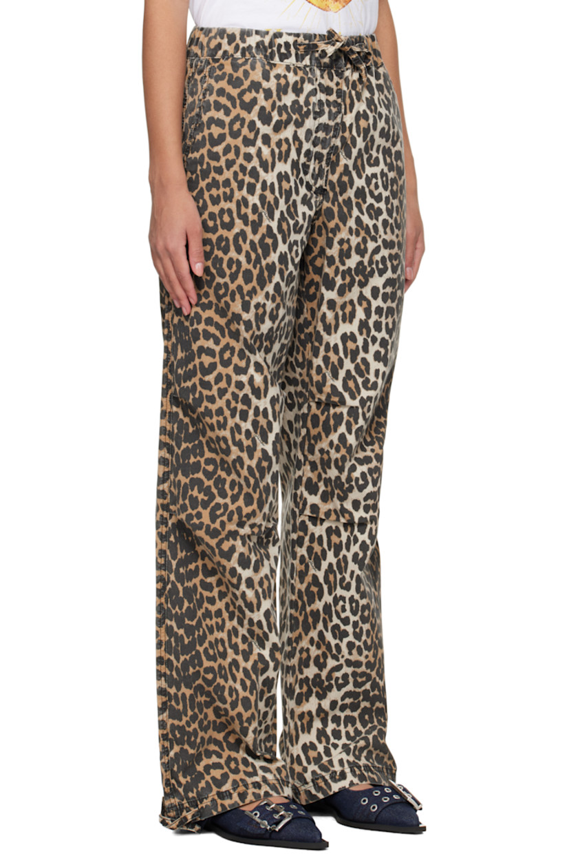 Stretch organic cotton canvas trousers. Logos and leopard pattern print throughout. 

· Drawstring at elasticized waistband and cuffs
· Three-pocket styling
· Zip-fly
· Tucks at knees
· Logo-engraved hardware

Supplier color: Almond milk
