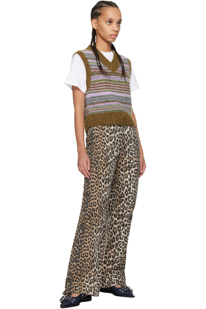 Stretch organic cotton canvas trousers. Logos and leopard pattern print throughout. 

· Drawstring at elasticized waistband and cuffs
· Three-pocket styling
· Zip-fly
· Tucks at knees
· Logo-engraved hardware

Supplier color: Almond milk