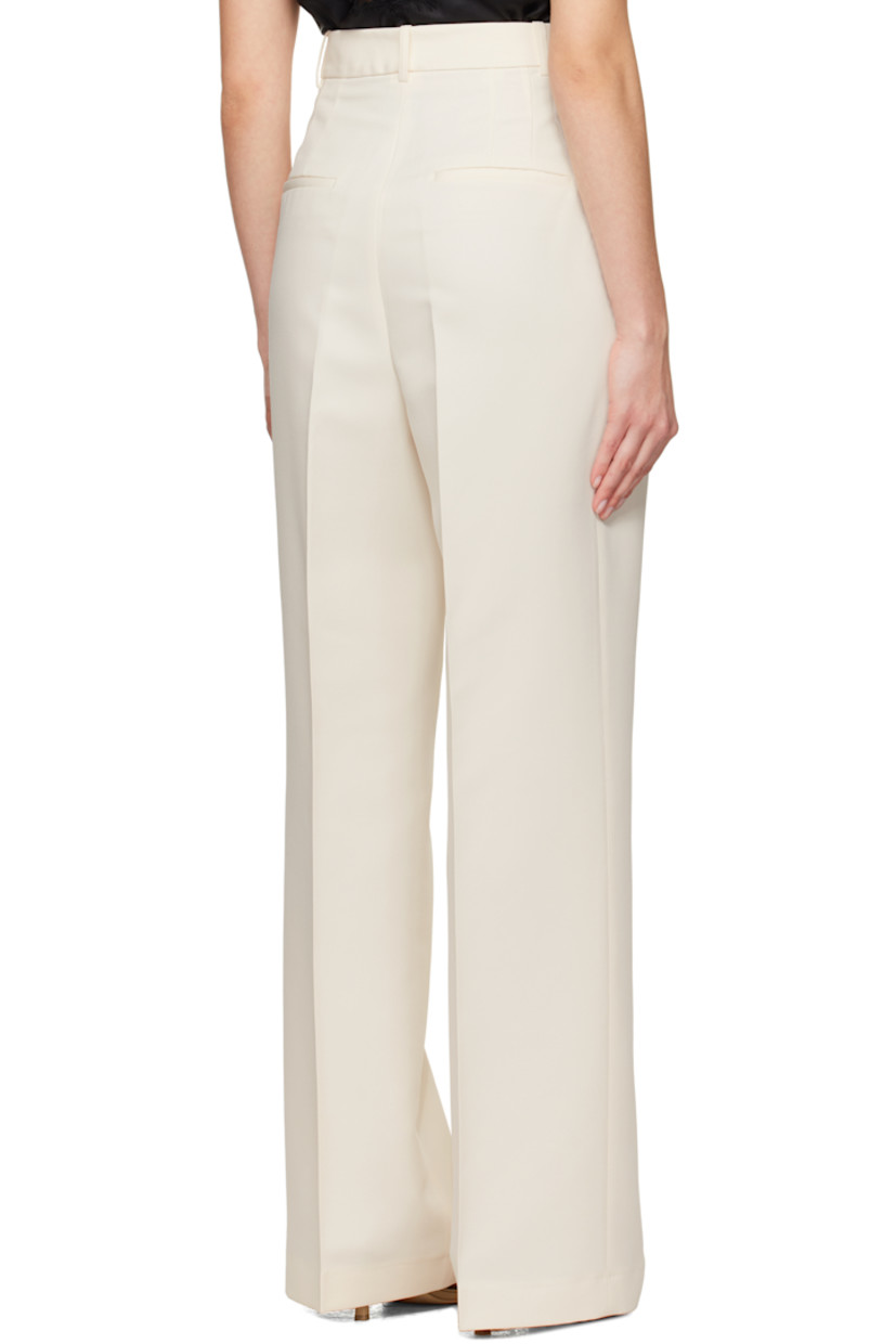 Wide-leg recycled polyester twill trousers. 

· High-rise 
· Belt loops
· Four-pocket styling
· Zip-fly
· Pleats at front
· Creased legs
· Darts at back waistband 
· Partial viscose twill lining

Supplier color: Off white