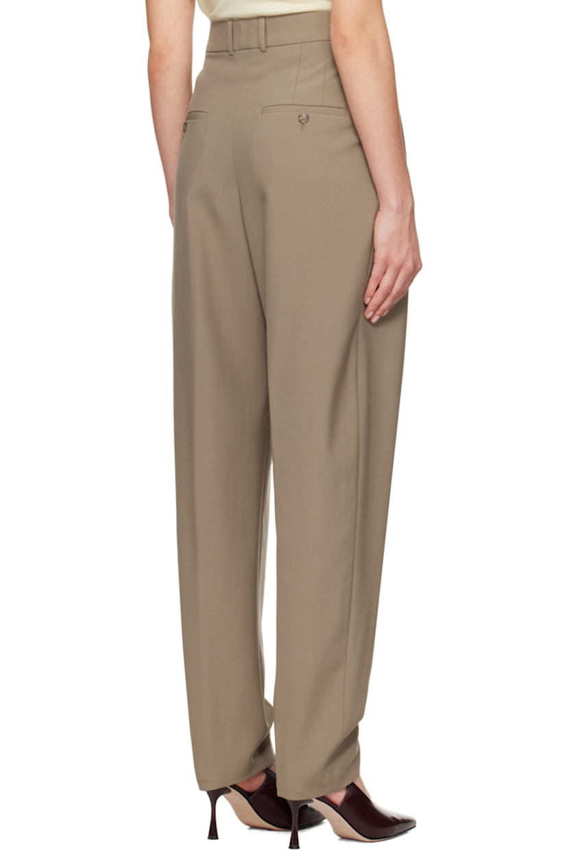 Relaxed-fit virgin wool broadcloth trousers. 

· High-rise
· Belt loops
· Four-pocket styling
· Zip-fly
· Pleats at front
· Creased legs
· Curved outseams
· Darts at back waistband 

Supplier color: Khaki