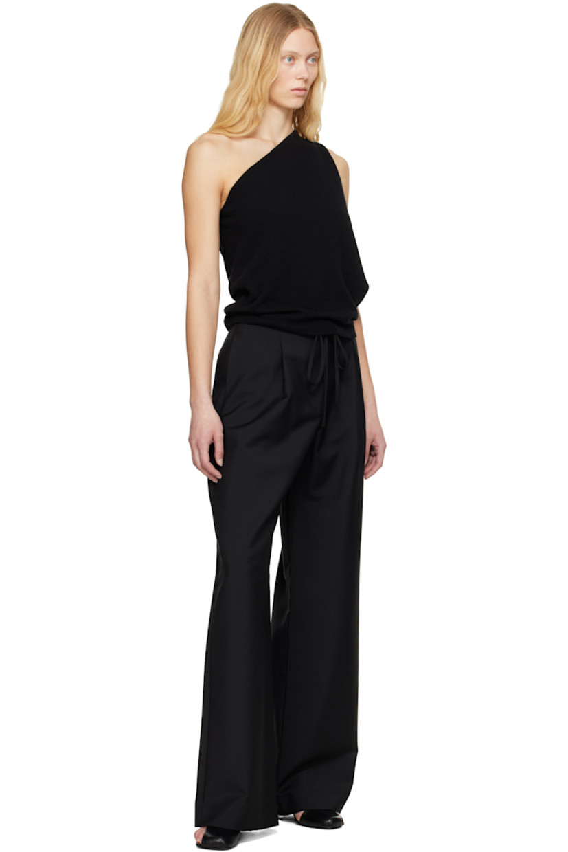 Loose-fit and wide-leg virgin wool- and mohair-blend hopsack trousers.

· Drawstring at waistband
· Four-pocket styling
· Zip fly
· Pleats at front

Supplier color: Black