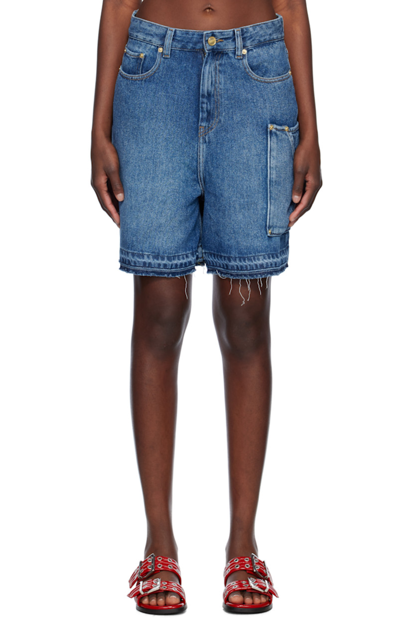 Non-stretch TENCEL™ lyocell denim shorts. Fading throughout. 

· Belt loops
· Five-pocket styling
· Zip fly 
· Frayed cuffs
· Patch pockets at outseam 
· Logo patch at back waistband
· Logo-engraved gold-tone hardware
· Contrast stitching in tan

Supplier color: Mid blue vintage