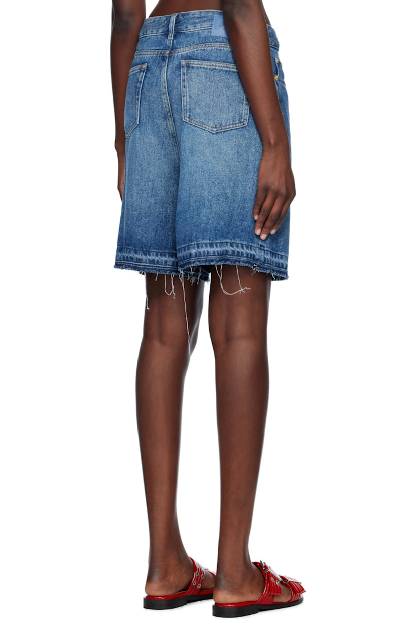 Non-stretch TENCEL™ lyocell denim shorts. Fading throughout. 

· Belt loops
· Five-pocket styling
· Zip fly 
· Frayed cuffs
· Patch pockets at outseam 
· Logo patch at back waistband
· Logo-engraved gold-tone hardware
· Contrast stitching in tan

Supplier color: Mid blue vintage