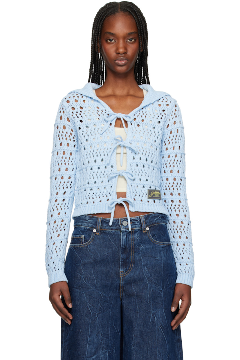 Open-knit recycled cotton- and recycled polyester-blend cardigan. 

· Rib-knit sailor collar, hem, and cuffs
· Self-tie fastenings at open front
· Logo patch at hem

Supplier color: Soft chambray