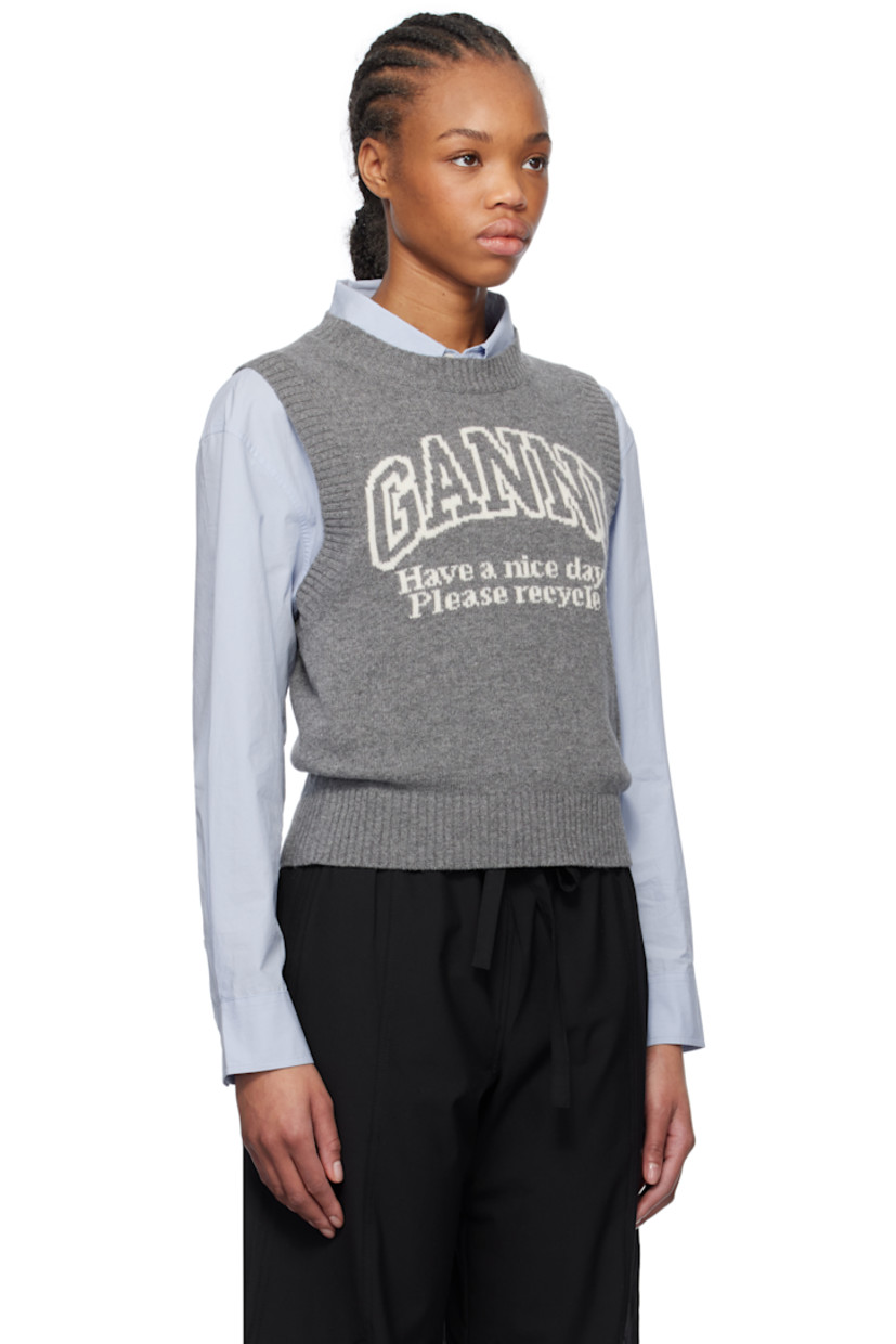 Knit recycled wool- and recycled nylon-blend vest. 

· Rib-knit crewneck, hem, and armscyes
· Jacquard logo and text at front

Supplier color: Frost gray
