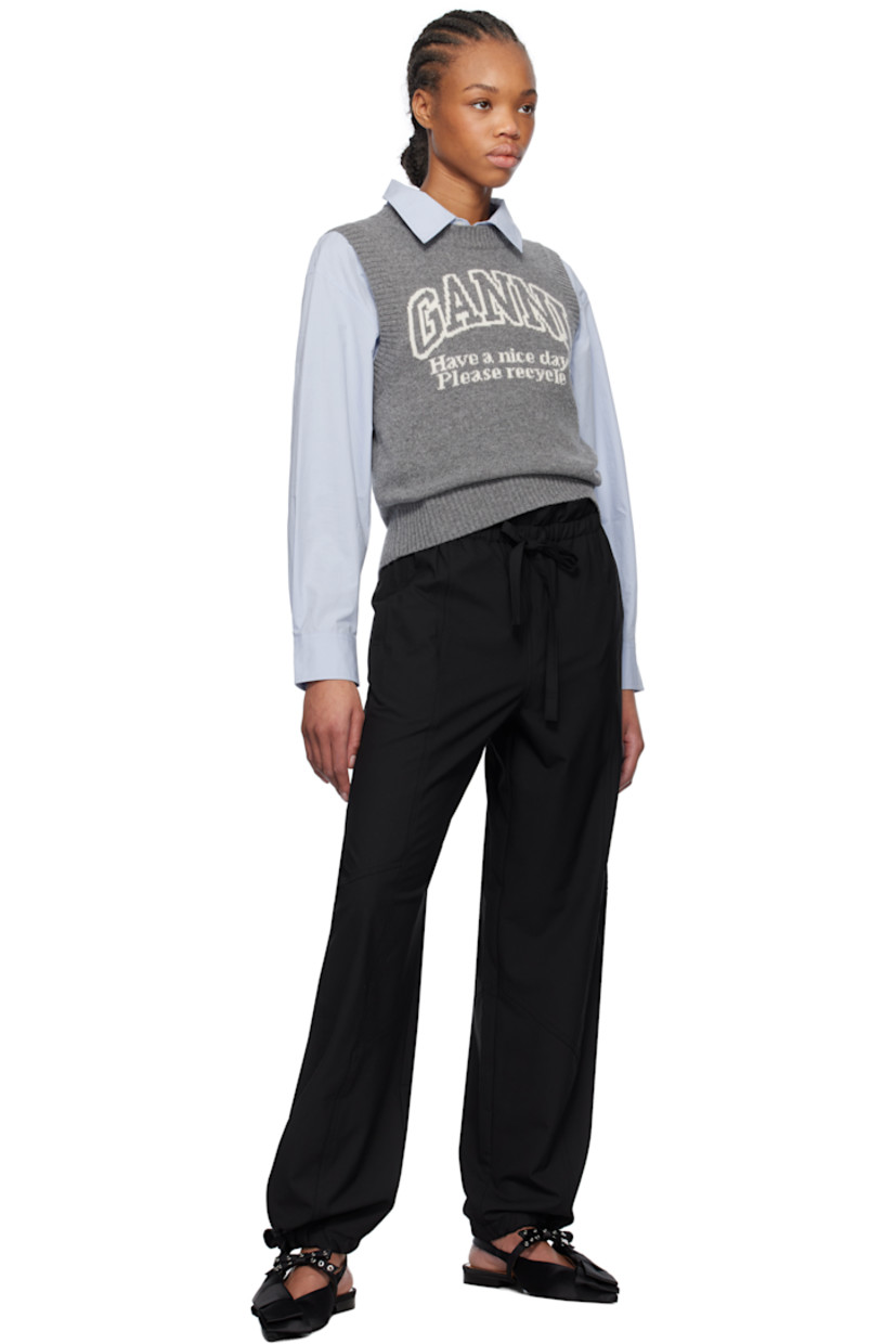 Knit recycled wool- and recycled nylon-blend vest. 

· Rib-knit crewneck, hem, and armscyes
· Jacquard logo and text at front

Supplier color: Frost gray