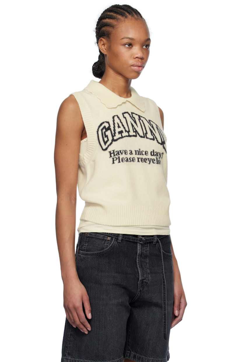Knit wool- and recycled wool-blend vest. 

· Rib-knit spread collar, hem, and armscyes
· Scalloped edge at collar
· Jacquard logo and text at front

Supplier color: Egret