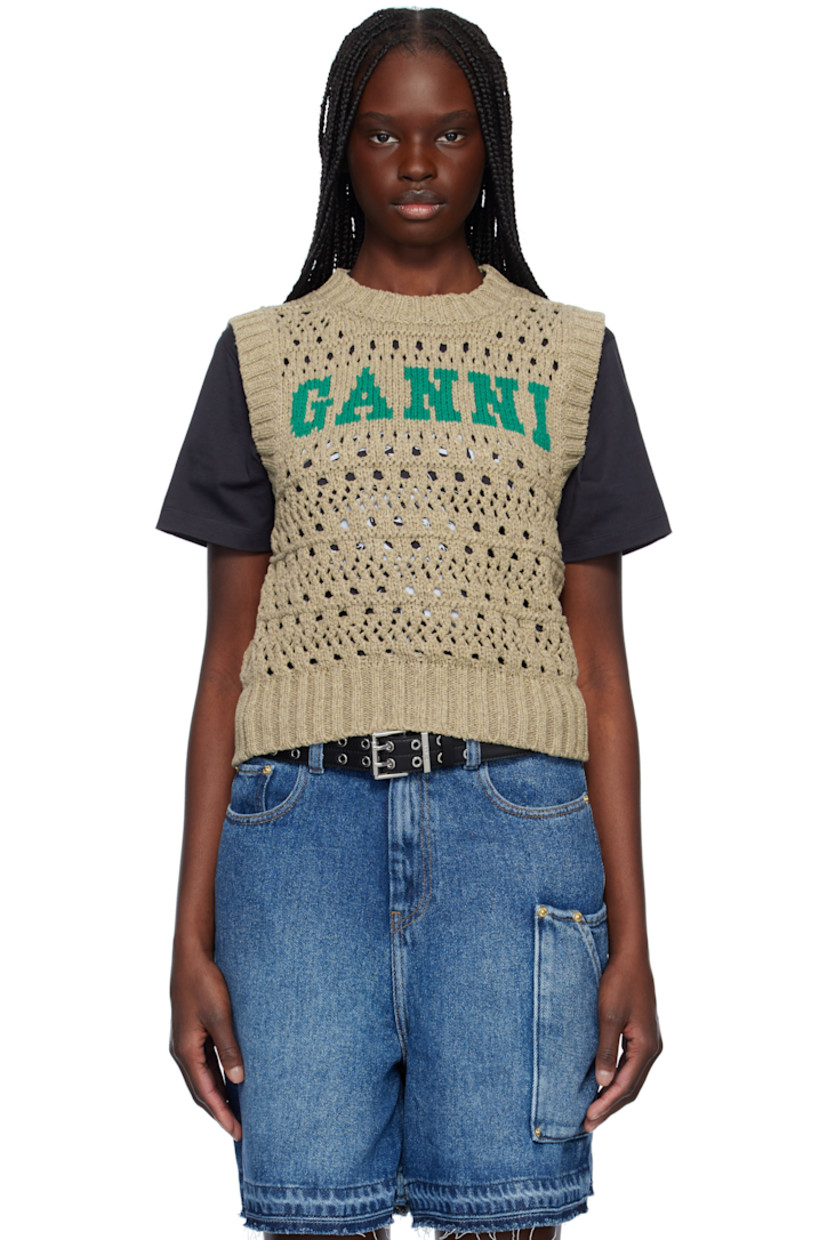 Open-knit recycled cotton- and recycled polyester-blend vest. 

· Rib-knit crewneck, hem, and armscyes
· Intarsia logo at front

Supplier color: Paloma melange