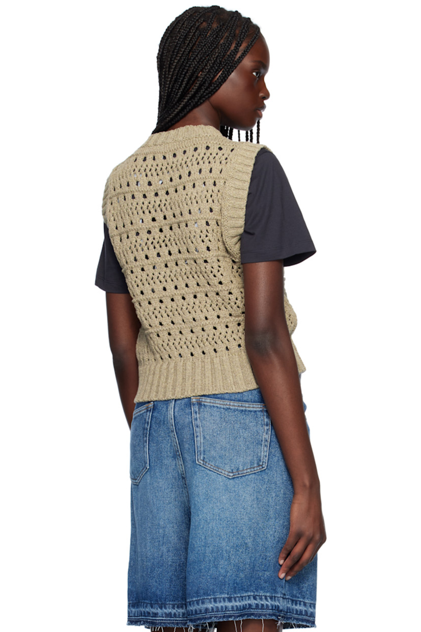 Open-knit recycled cotton- and recycled polyester-blend vest. 

· Rib-knit crewneck, hem, and armscyes
· Intarsia logo at front

Supplier color: Paloma melange