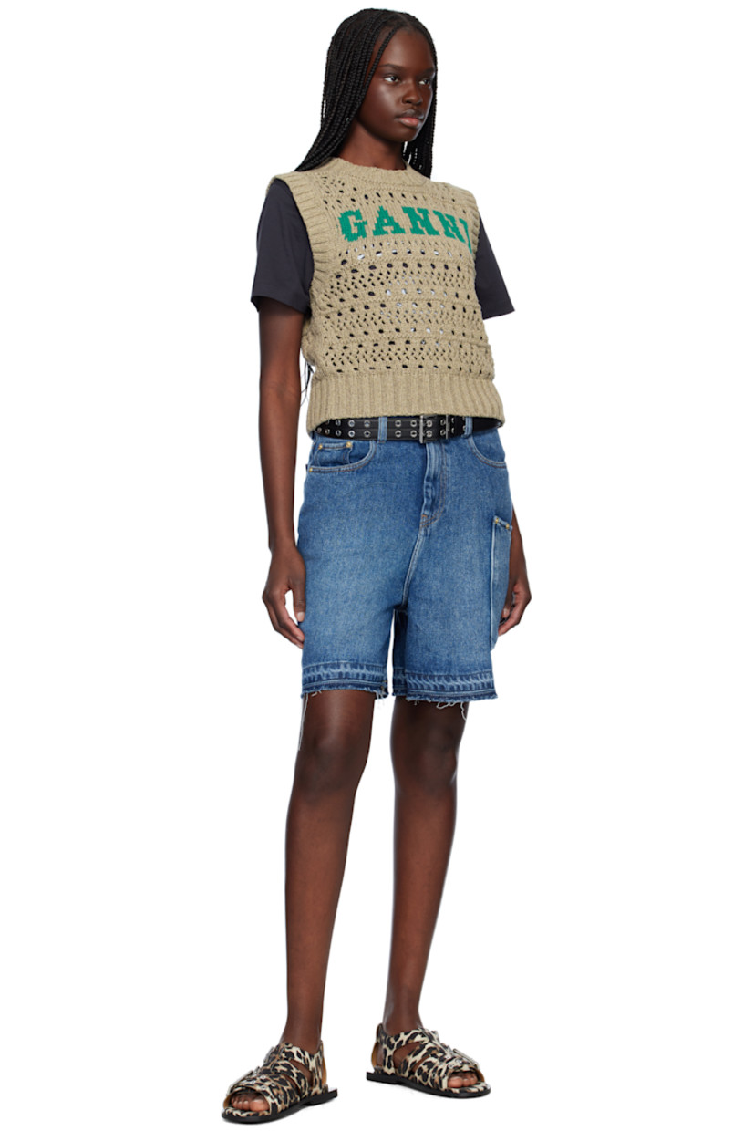 Open-knit recycled cotton- and recycled polyester-blend vest. 

· Rib-knit crewneck, hem, and armscyes
· Intarsia logo at front

Supplier color: Paloma melange