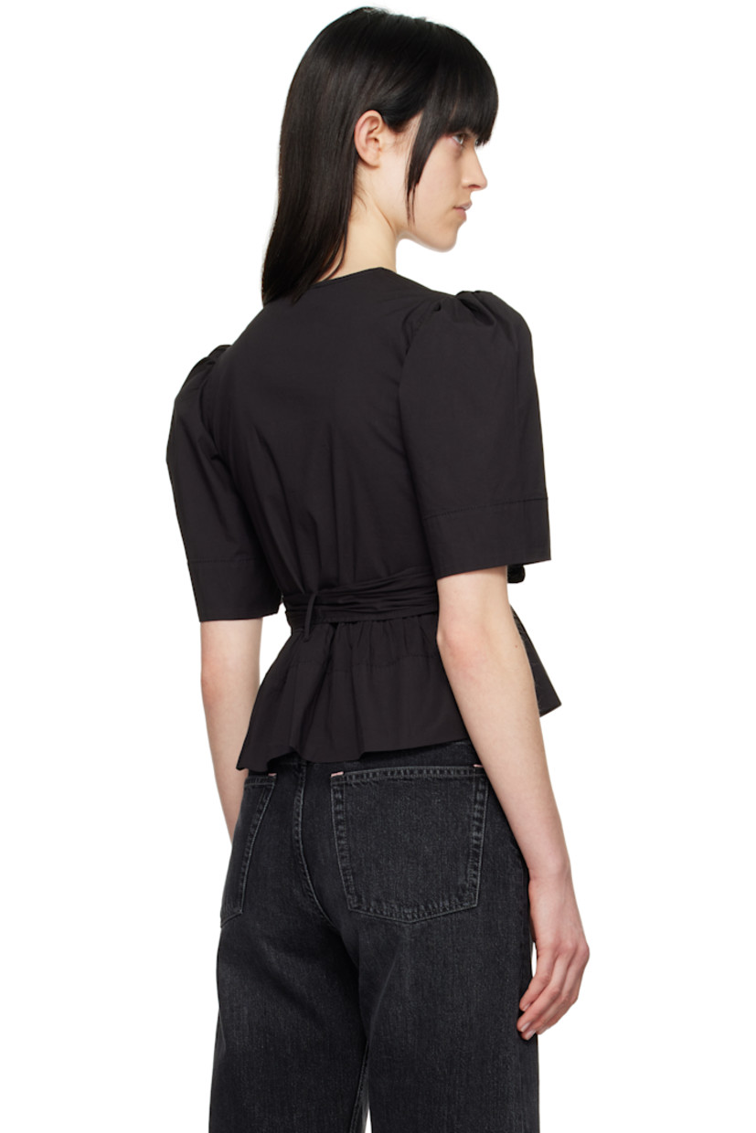 Stretch organic cotton poplin blouse. Gathering throughout.

· Self-tie fastenings at plunging V-neck
· Darts at chest
· Belt loops at waist with detachable self-tie belt
· Peplum hem
· Puff sleeves

Supplier color: Black