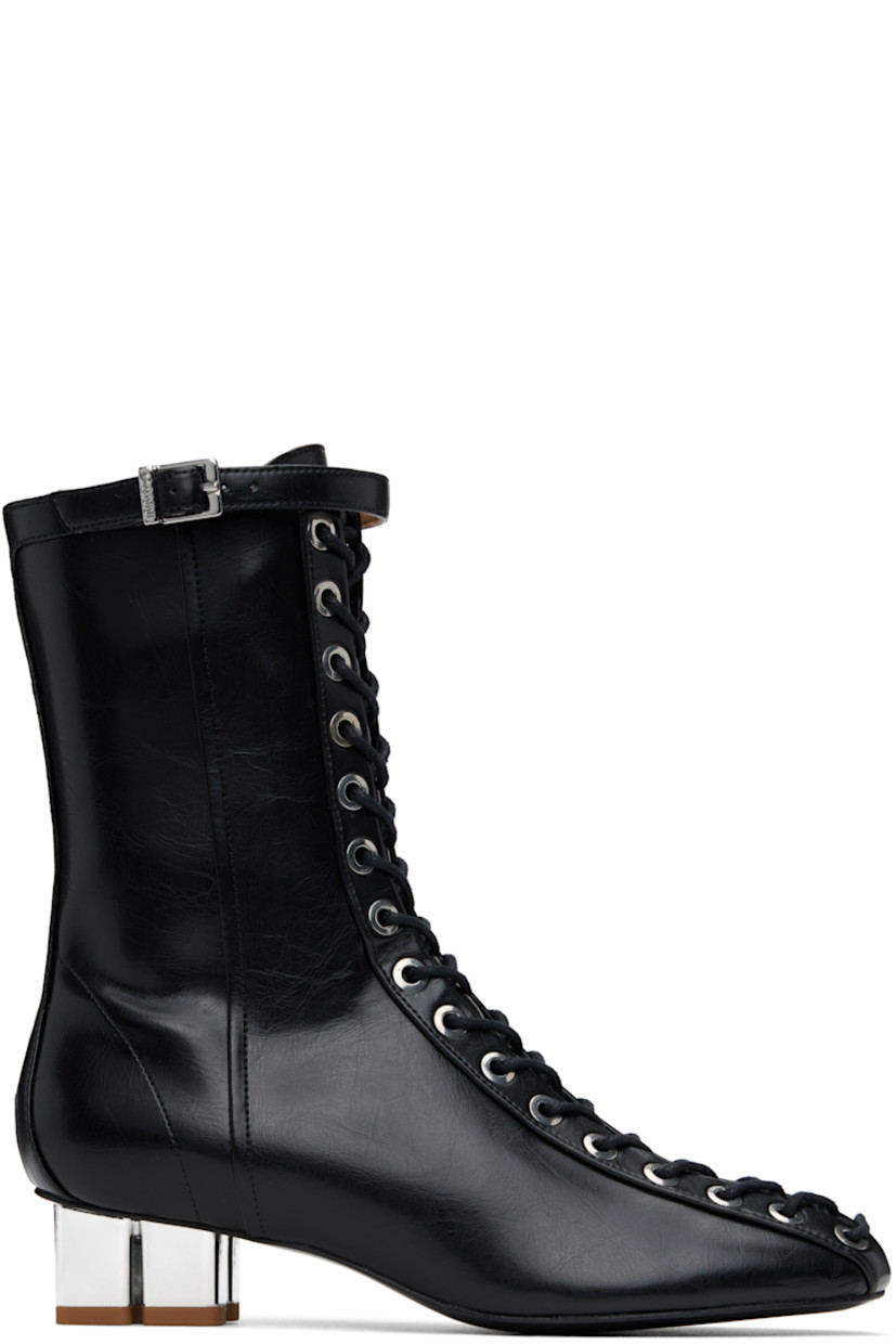 Ankle-high grained Oleatex® faux-leather boots in black.

· Square toe 
· Lace-up closure
· Pin-buckle strap at collar
· Zip closure at inner side
· Silver-tone logo kitten heel 
· Faux-leather sole with rubber injections
· Logo-engraved silver-tone hardware
· Heel: H1.5"

Supplier color: Black