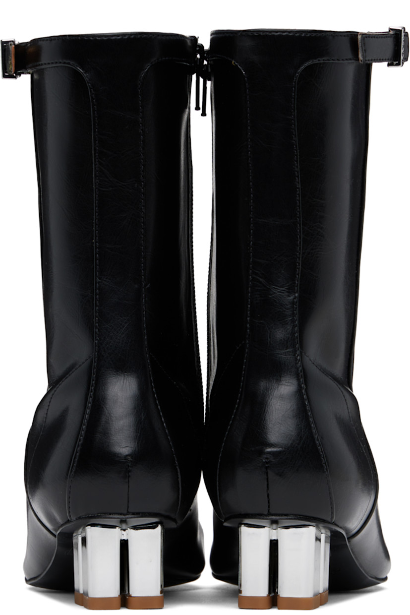 Ankle-high grained Oleatex® faux-leather boots in black.

· Square toe 
· Lace-up closure
· Pin-buckle strap at collar
· Zip closure at inner side
· Silver-tone logo kitten heel 
· Faux-leather sole with rubber injections
· Logo-engraved silver-tone hardware
· Heel: H1.5"

Supplier color: Black