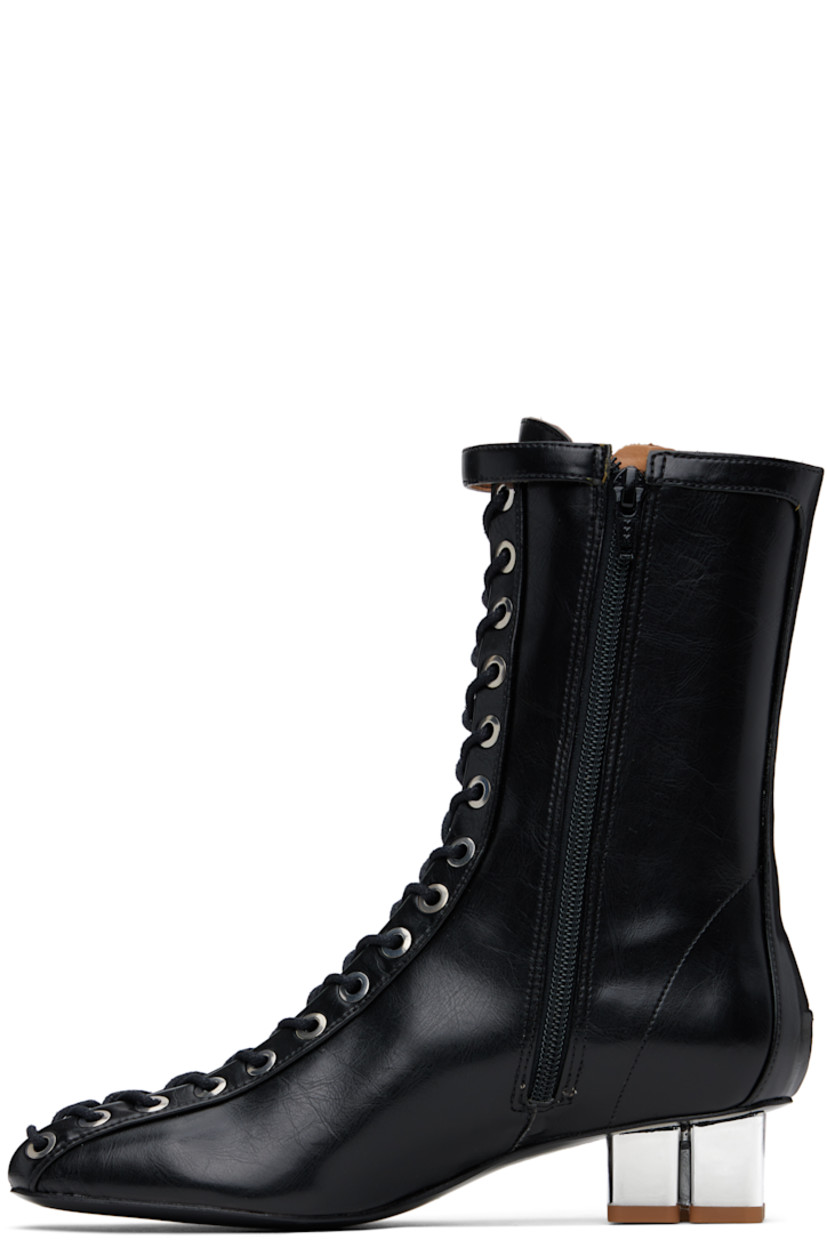 Ankle-high grained Oleatex® faux-leather boots in black.

· Square toe 
· Lace-up closure
· Pin-buckle strap at collar
· Zip closure at inner side
· Silver-tone logo kitten heel 
· Faux-leather sole with rubber injections
· Logo-engraved silver-tone hardware
· Heel: H1.5"

Supplier color: Black