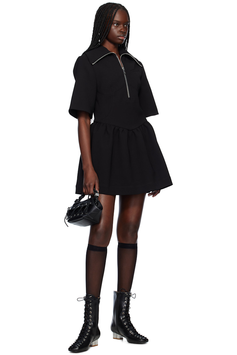 Ankle-high grained Oleatex® faux-leather boots in black.

· Square toe 
· Lace-up closure
· Pin-buckle strap at collar
· Zip closure at inner side
· Silver-tone logo kitten heel 
· Faux-leather sole with rubber injections
· Logo-engraved silver-tone hardware
· Heel: H1.5"

Supplier color: Black