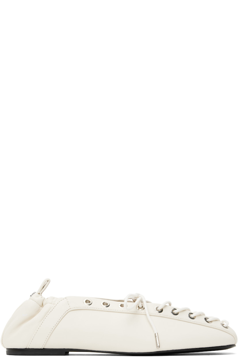 Buffed Pélinova® faux-leather ballerina flats in off-white.

· Square toe
· Lace-up closure
· Metal eyelets at collar
· Pull-loop with logo hardware at elasticized heel collar
· Buffed faux-leather lining
· Polished faux-leather sole with rubber injections
· Silver-tone hardware

Supplier color: Egret