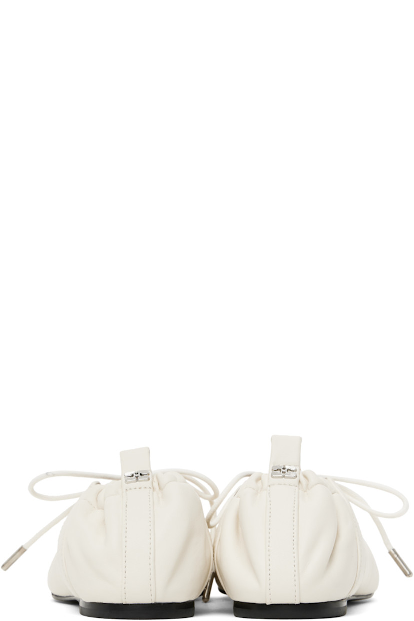 Buffed Pélinova® faux-leather ballerina flats in off-white.

· Square toe
· Lace-up closure
· Metal eyelets at collar
· Pull-loop with logo hardware at elasticized heel collar
· Buffed faux-leather lining
· Polished faux-leather sole with rubber injections
· Silver-tone hardware

Supplier color: Egret