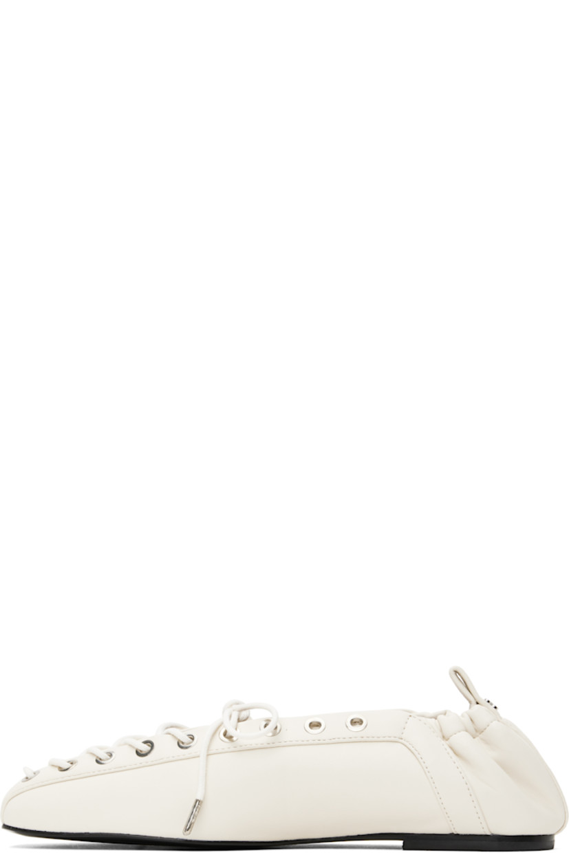 Buffed Pélinova® faux-leather ballerina flats in off-white.

· Square toe
· Lace-up closure
· Metal eyelets at collar
· Pull-loop with logo hardware at elasticized heel collar
· Buffed faux-leather lining
· Polished faux-leather sole with rubber injections
· Silver-tone hardware

Supplier color: Egret