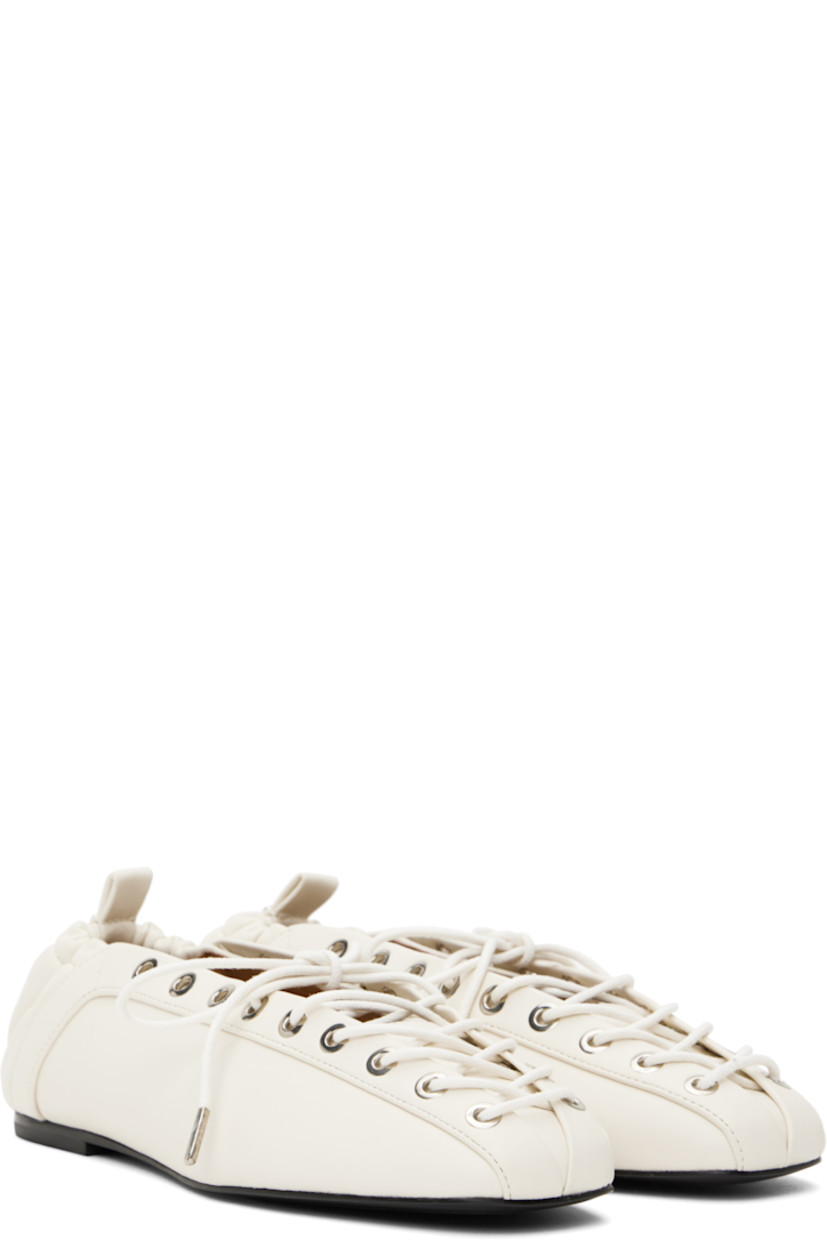 Buffed Pélinova® faux-leather ballerina flats in off-white.

· Square toe
· Lace-up closure
· Metal eyelets at collar
· Pull-loop with logo hardware at elasticized heel collar
· Buffed faux-leather lining
· Polished faux-leather sole with rubber injections
· Silver-tone hardware

Supplier color: Egret