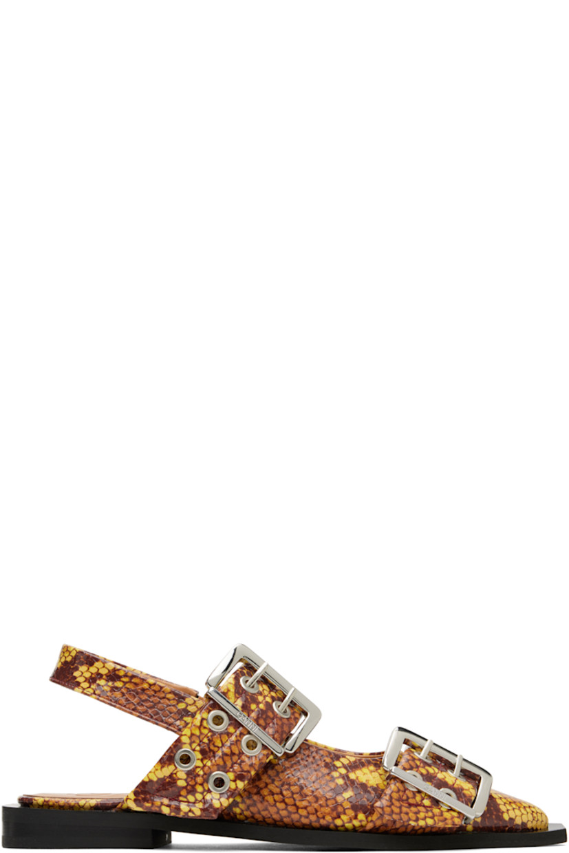 Snake-embossed patent recycled leather flats in tones of brown.

· GRS-certified recycled leather
· Pointed toe
· Pin-buckle straps at vamp
· Partially elasticized slingback strap
· Buffed faux-leather lining
· Padded footbed
· Rubber sole
· Logo-engraved silver-tone hardware

Supplier color: Sand