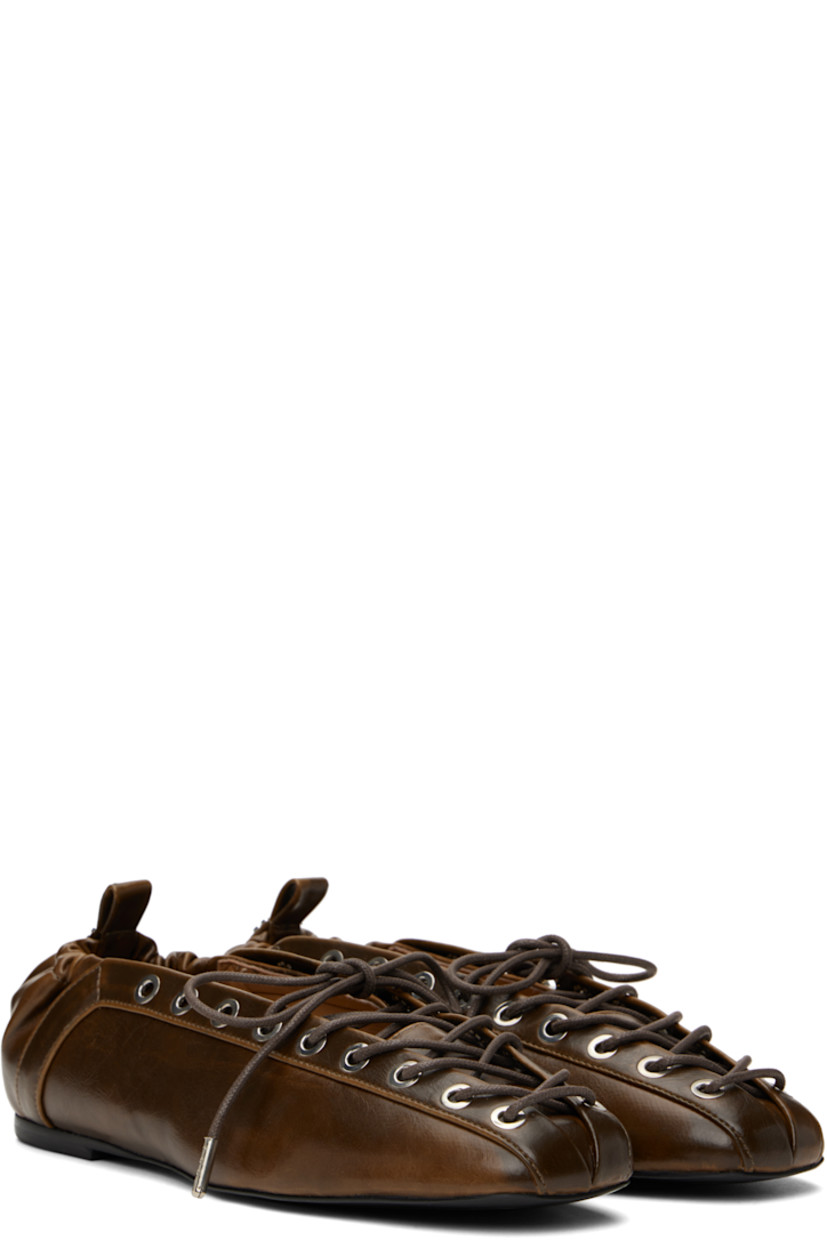 Crinkled Oleatex® faux-leather ballerina flats in khaki.

· Fading throughout
· Square toe
· Lace-up closure
· Metal eyelets at collar
· Pull-loop with logo hardware at elasticized heel collar
· Buffed faux-leather lining
· Polished faux-leather sole with rubber injections
· Silver-tone hardware

Supplier color: Dark olive