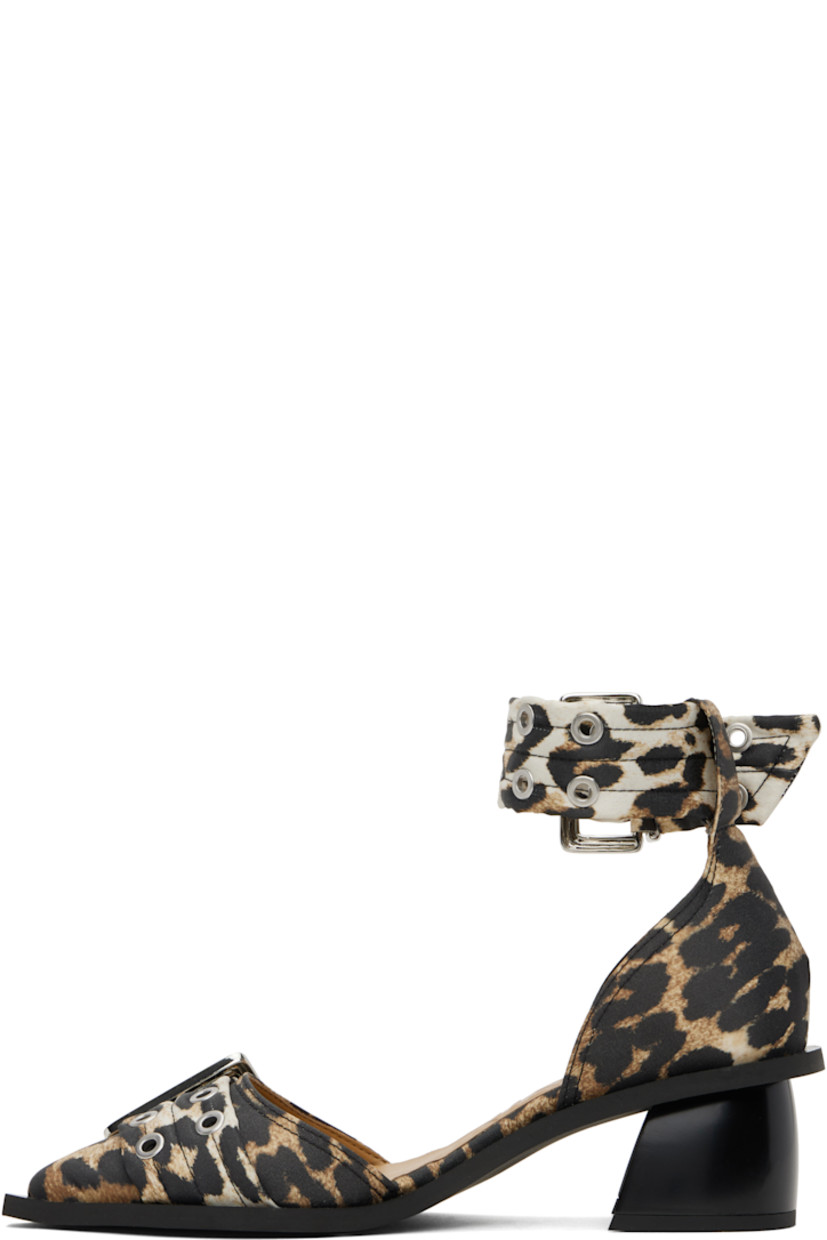 Satin heels in tan and black. 

· Leopard pattern throughout
· Pointed toe
· Pin-buckle strap at vamp
· Pin-buckle ankle strap
· Logo embossed at padded footbed
· Covered block heel with rubber injection
· Rubber sole
· Logo-engraved silver-tone hardware
· Heel: H2"

Supplier color: Leopard