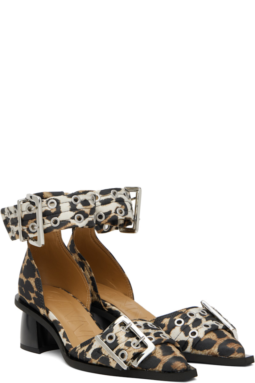 Satin heels in tan and black. 

· Leopard pattern throughout
· Pointed toe
· Pin-buckle strap at vamp
· Pin-buckle ankle strap
· Logo embossed at padded footbed
· Covered block heel with rubber injection
· Rubber sole
· Logo-engraved silver-tone hardware
· Heel: H2"

Supplier color: Leopard