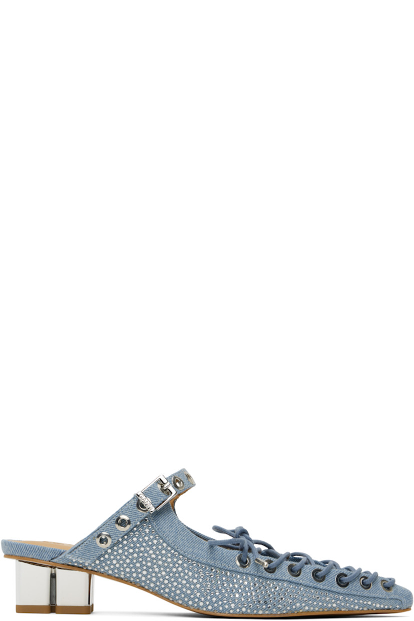 Denim mules in blue.

· Crystal-cut detailing throughout
· Pointed toe
· Lace-up closure 
· Pin-buckle strap at vamp
· Logo embossed at padded faux-leather footbed
· Logo graphic heel with rubber injection 
· Faux-leather sole with rubber injection
· Logo-engraved silver-tone hardware
· Heel: H1.5"

Supplier color: Faded denim
