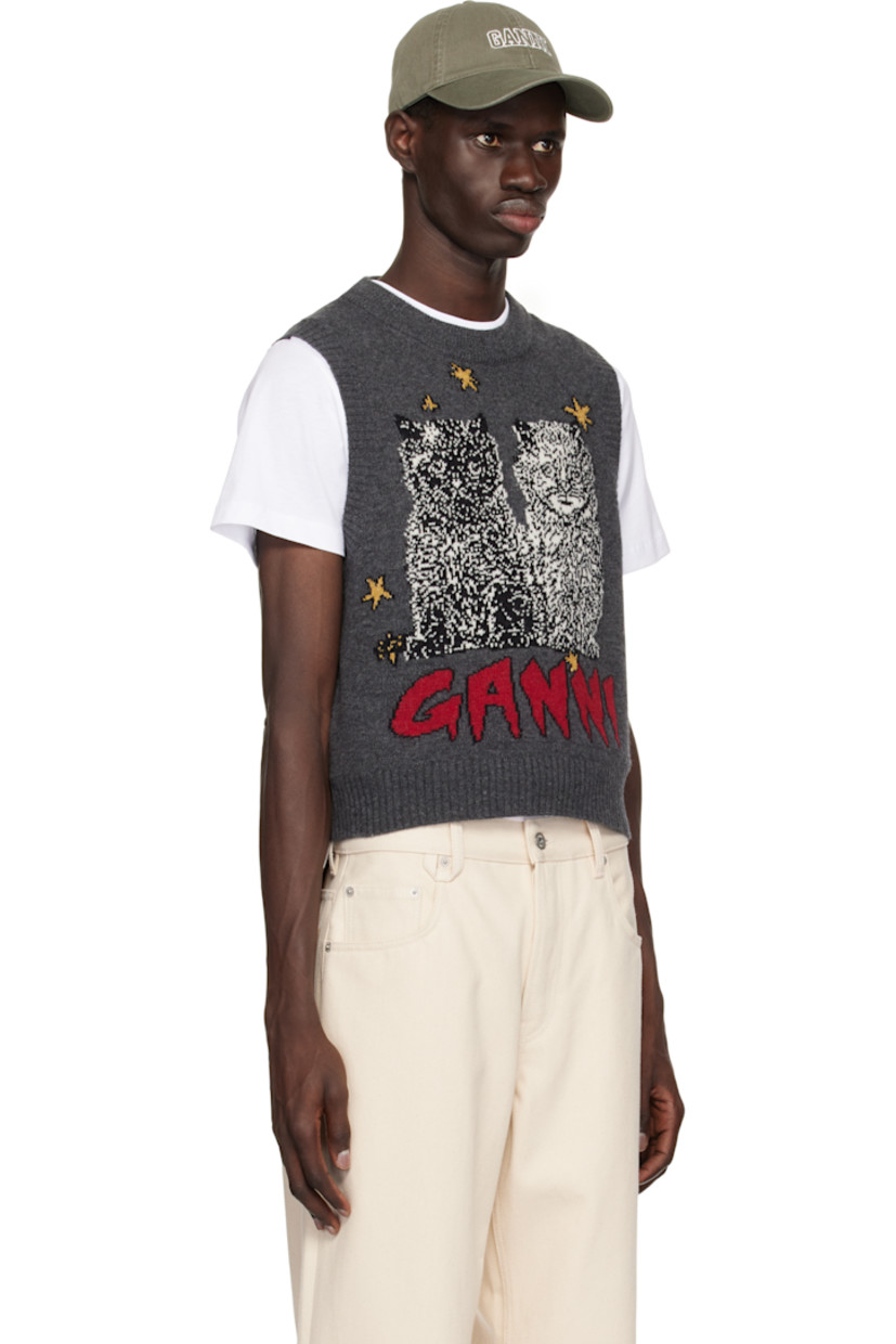 Knit wool- and recycled wool-blend vest.

· Rib-knit crewneck, hem, and armscyes
· Jacquard logo and graphic at front
· Metallic thread detailing at front

Supplier color: Gray quill