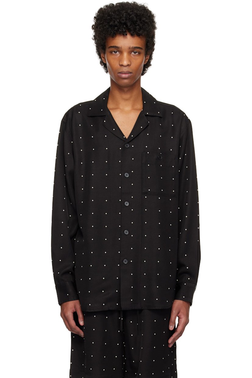 Viscose- and lyocell-blend twill shirt. Polka-dot pattern printed throughout. 

· Open spread collar
· Button closure
· Patch pocket at chest
· Shirttail hem 
· Dropped shoulders
· Pleated single-button barrel cuffs

Supplier color: Black/Cream dot