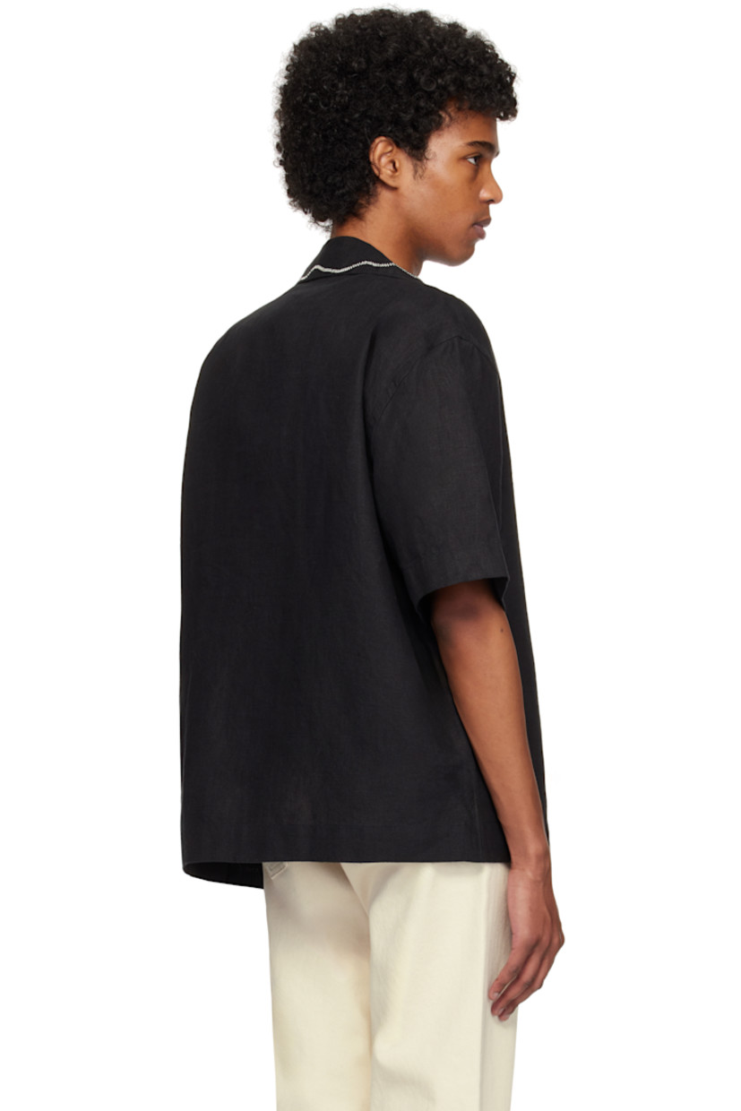 Linen hopsack shirt. Hand-embroidered detailing at collar and pocket.

· Open spread collar
· Button closure
· Patch pocket
· Dropped shoulders

Supplier color: Black