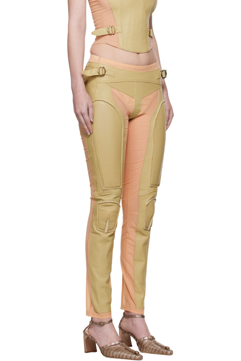 Handcrafted grained lambskin and stretch nylon mesh trousers.

· Semi-sheer mesh
· Paneled construction 
· Adjustable pin-buckle straps at waistband
· Perforated padding at front legs
· Zip closure at back waist
· Concealed zip closure at back 
· Unlined
· Antiqued gold-tone hardware 

Supplier color: Pale olive