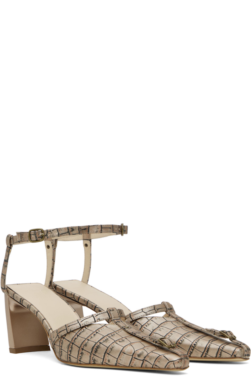 Croc-embossed leather mules in beige and black.

· Pointed square toe 
· Pin-buckle strap, rivet, and cutouts at vamp
· Pin-buckle ankle strap
· Logo-embossed padded leather footbed
· Covered block heel with rubber injection
· Leather sole
· Heel: H2.75"

Supplier color: Beige croc
