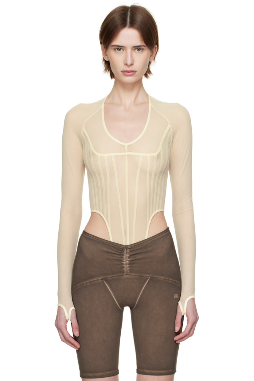 Stretch nylon mesh bodysuit.

· Plunging scoop neck
· Adjustable press-stud closure at bottom
· Thumbhole at cuffs

Supplier color: Ecru