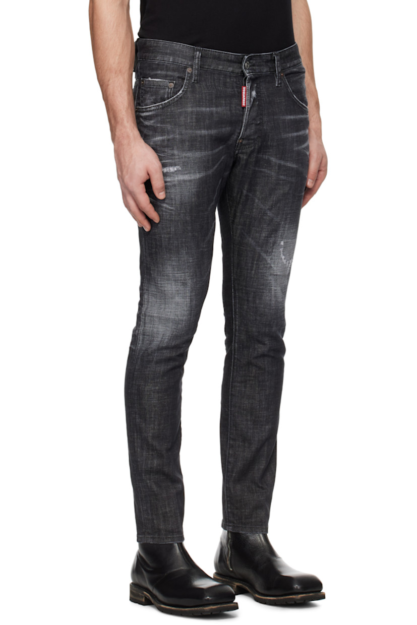 Slim-fit stretch denim jeans. Fading, whiskering, and distressing throughout.

· Belt loops
· Five-pocket styling
· Logo flag at button-fly
· Logo patch at back waistband
· Logo-engraved silver- and copper-tone hardware

Supplier color: Black