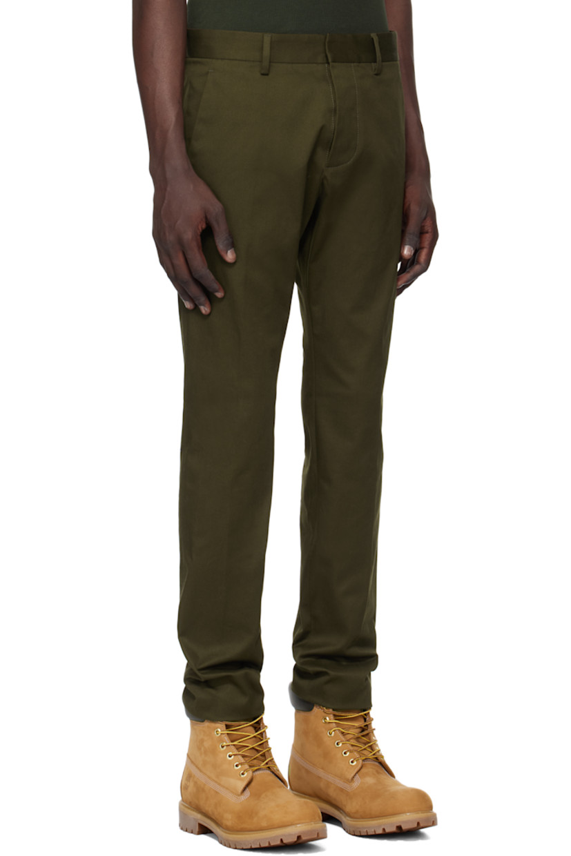 Slim-fit stretch cotton twill trousers.

· Belt loops
· Four-pocket styling
· Button-fly
· Logo plaque at back 

Supplier color: Military green