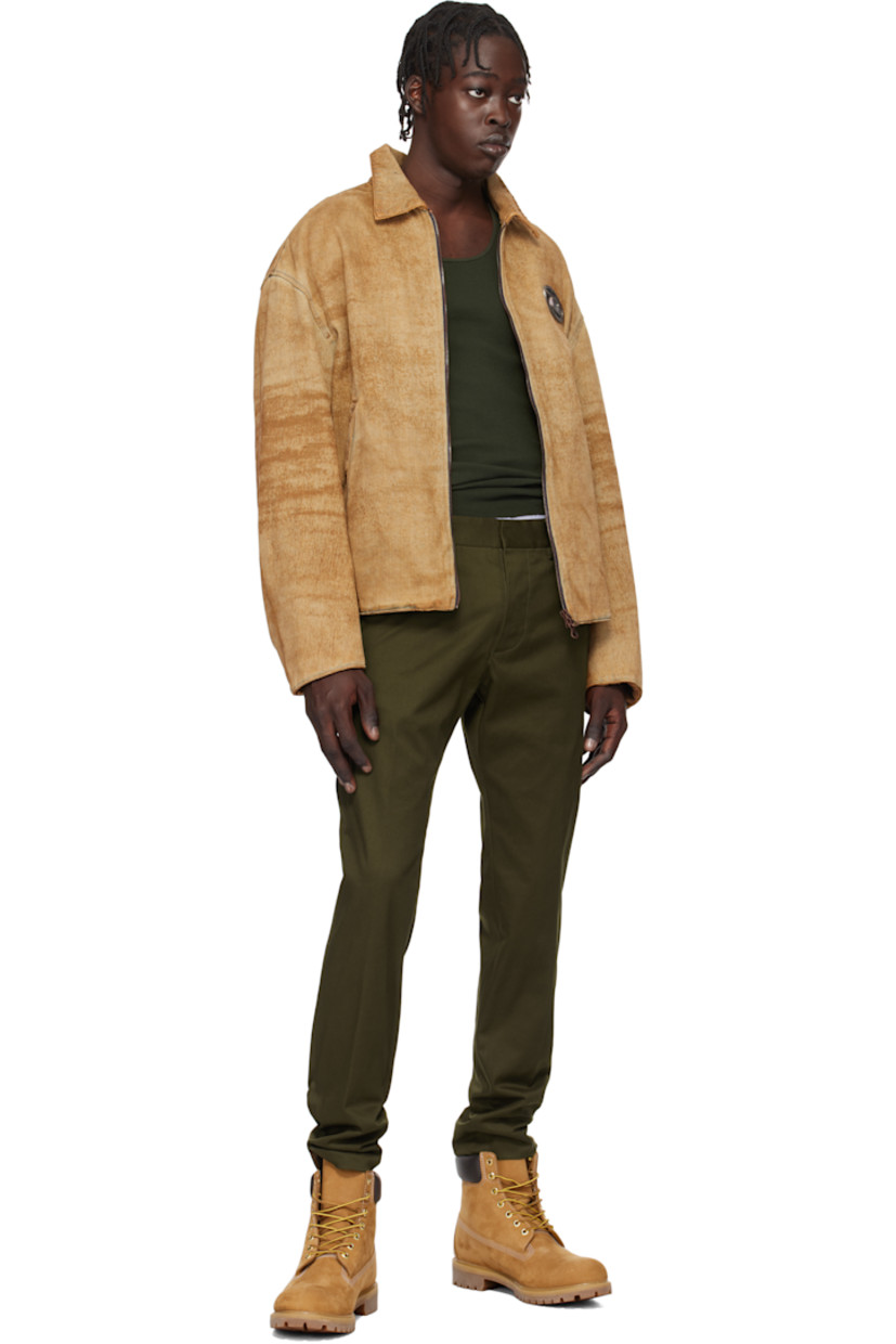 Slim-fit stretch cotton twill trousers.

· Belt loops
· Four-pocket styling
· Button-fly
· Logo plaque at back 

Supplier color: Military green