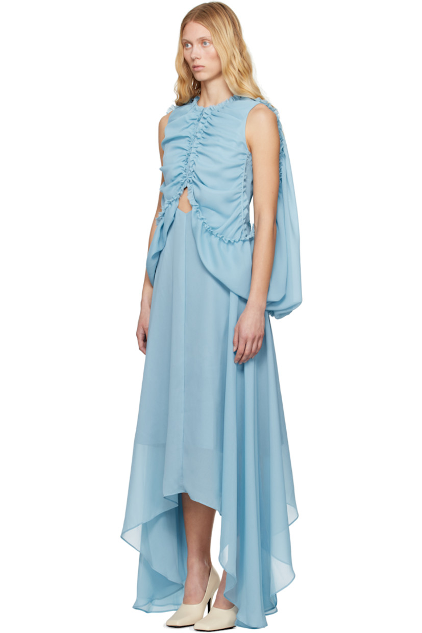 Polyester chiffon midi dress. Shirring, ruffles, and raw edges throughout. 

· Round neck
· Button closure 
· Cutout at front waist 
· Handkerchief hem
· Draping and cutout at cape-style sleeves 
· Concealed zip closure at back collar
· Partial twill lining 

Supplier color: Smoke blue