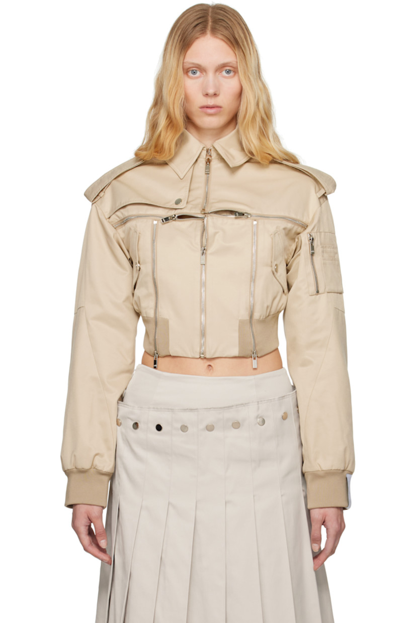 Polyester- and cotton-blend twill jacket. 

· Hook-eye fastening at spread collar
· Zip closure
· Zip vents and storm flap at chest
· Flap pockets
· Rib-knit cropped hem and cuffs
· Epaulets
· Utility pocket and pen slots at sleeve
· Logo patch at cuff
· Full quilted satin lining 

Supplier color: Champagne beige