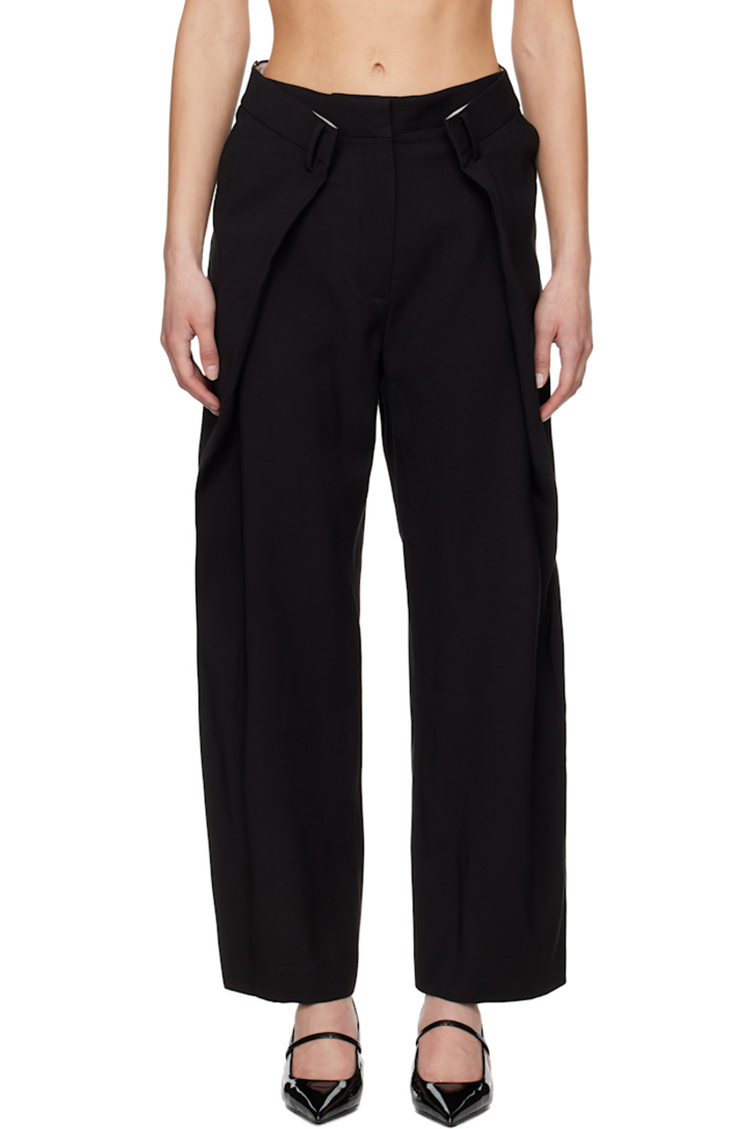 Viscose- and tencel-blend twill trousers. 

· Belt loops
· Folds at front waistband 
· Four-pocket styling
· Zip fly
· Pleats at front 

Supplier color: Black