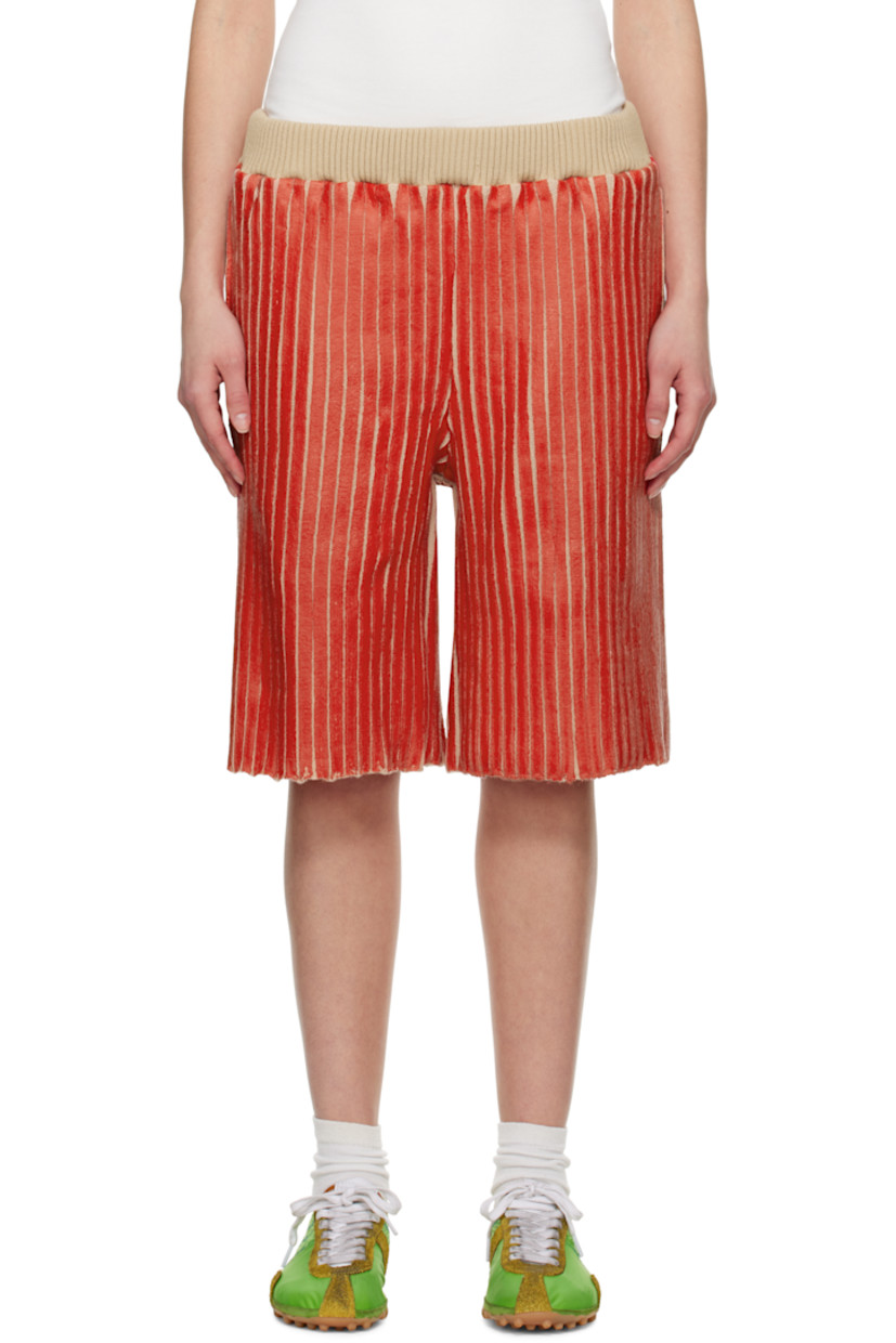 Coated rib-knit merino wool-blend shorts.

· Concealed drawstring at elasticized waistband
· Three-pocket styling

Available exclusively at SSENSE.

Supplier color: Red