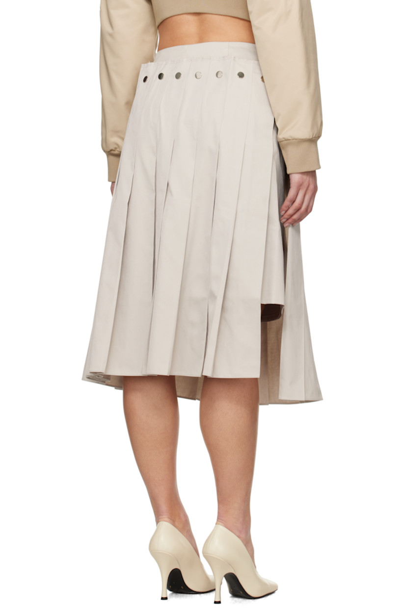 Polyester- and cotton-blend twill midi skirt. 

· Layered construction
· Raw edge and pleats at detachable overlay 
· Zip closure at side seam
· Concealed central vent at back hem 
· Full satin lining 

Supplier color: Oat beige
